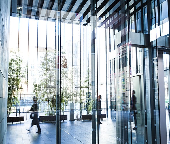 people waling inside a building